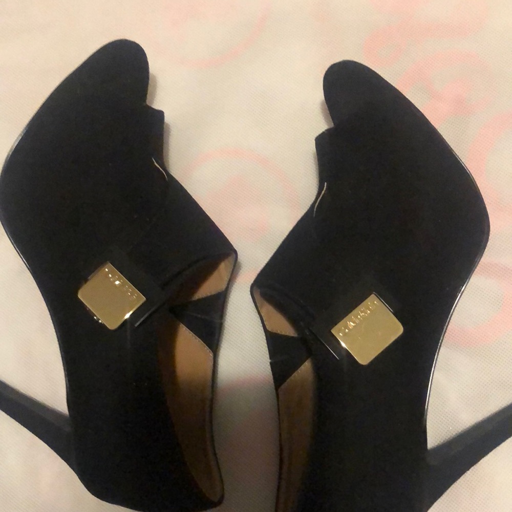 Black peeped toe high heel boots